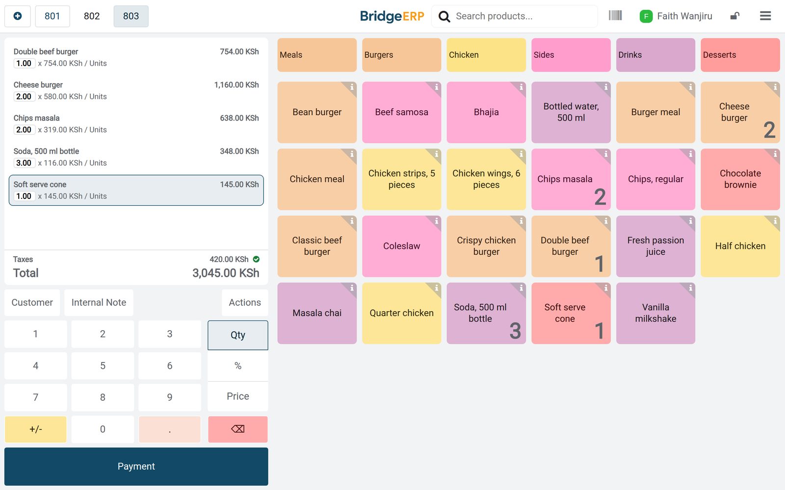 BridgeERP point of sale till at a fast food counter: burgers, chips masala, sodas and a cone