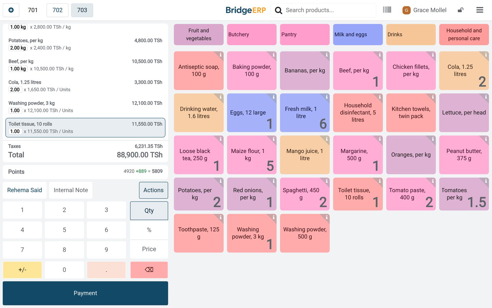 BridgeERP point of sale checkout at a supermarket: fourteen lines, weighed and packaged, for a loyalty member